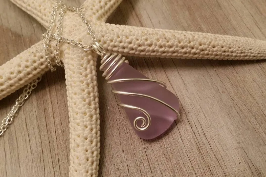 Made in Hawaii, Wire wraped "Magical Color Changing" Purple sea glass necklace