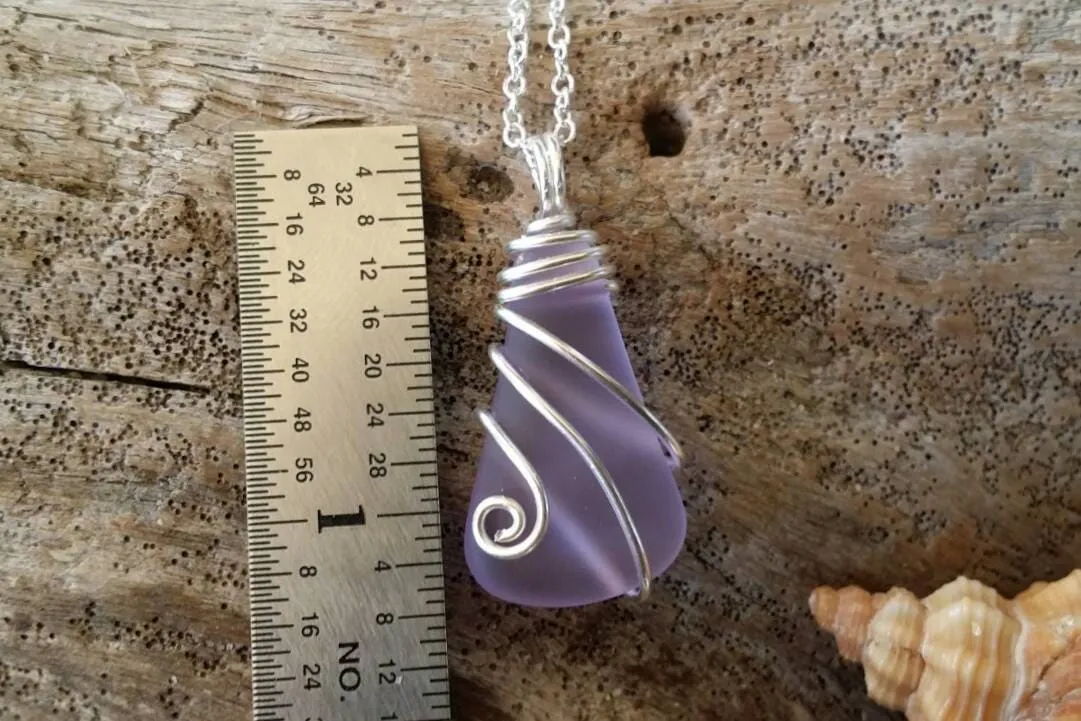 Made in Hawaii, Wire wraped "Magical Color Changing" Purple sea glass necklace